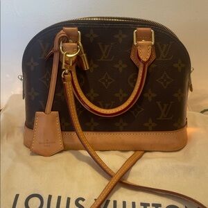 Louis Vuitton Mini Alma Handbag Crossbody Bag. Great Condition. Authentic